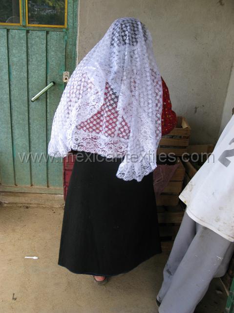 quechquemitl_chicometepec_12.JPG - This is how the quechquemitl looks from the back, these garments are traditional , however they are almost all made from store bought material. Closer to Cuetzalan there are still people that weave them.